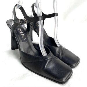 Black leather squared toe high heels